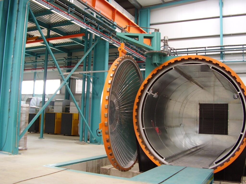 Industrial autoclave used to bond laminated glass plies and interlayers
